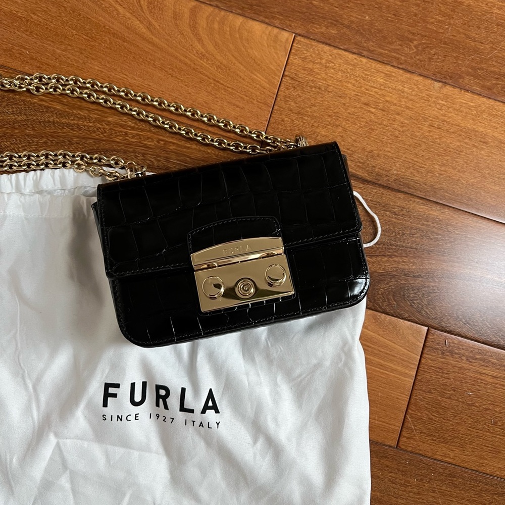 Furla mini bag never used
